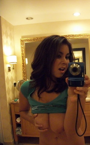 Asian babe Marica Hase takes self shots of her trimmed pussy